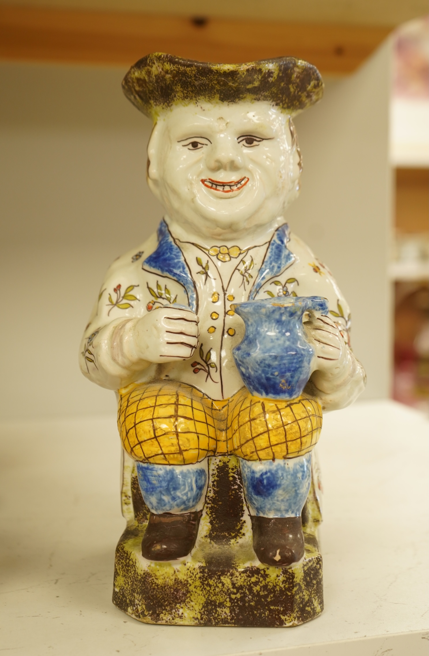 A French 'Rouen' Faience Toby Jug, 20th century, 25cm
